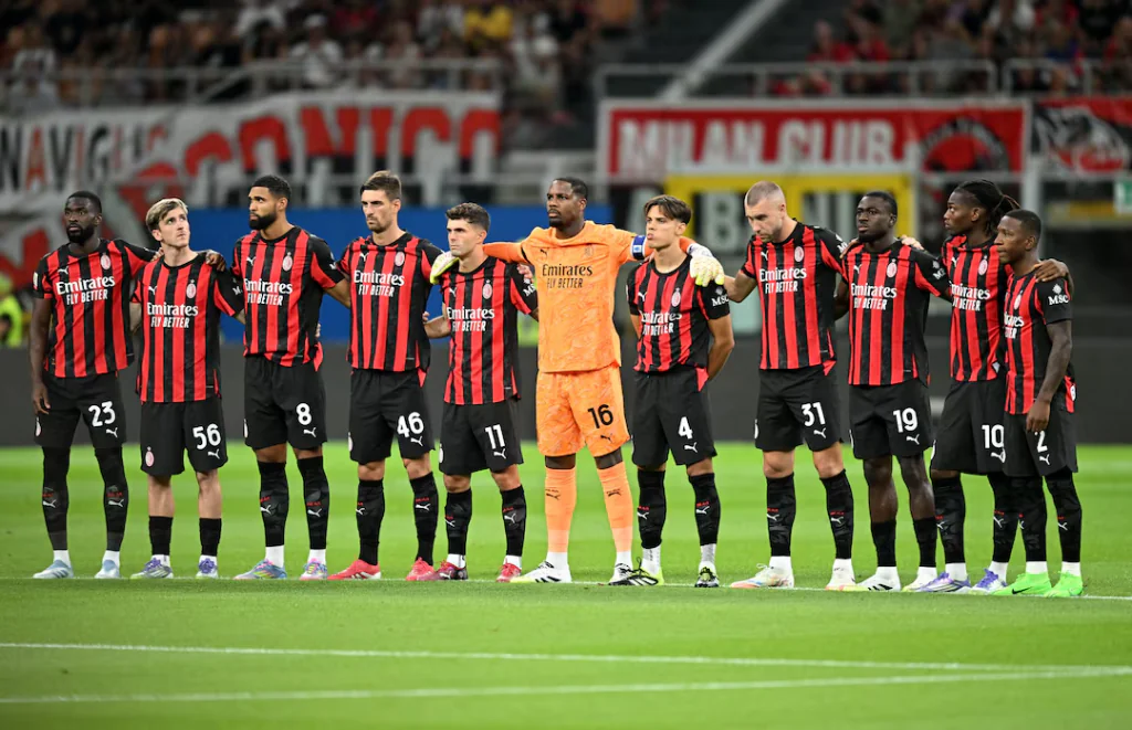 AC Milan players line up before Coppa Italia match at San Siro