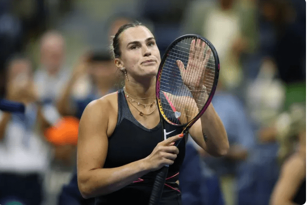 A high-resolution action shot of Aryna Sabalenka at the US Open, ideally celebrating a win