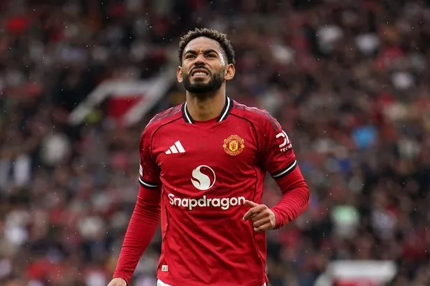 Matheus Cunha leaves the pitch injured during Manchester United vs Burnley