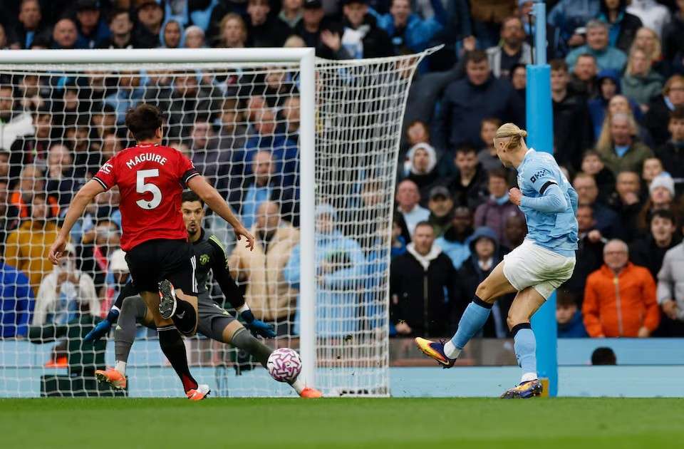 Erling Haaland celebrates after scoring against Manchester United in the Manchester Derby at the Etihad Stadium