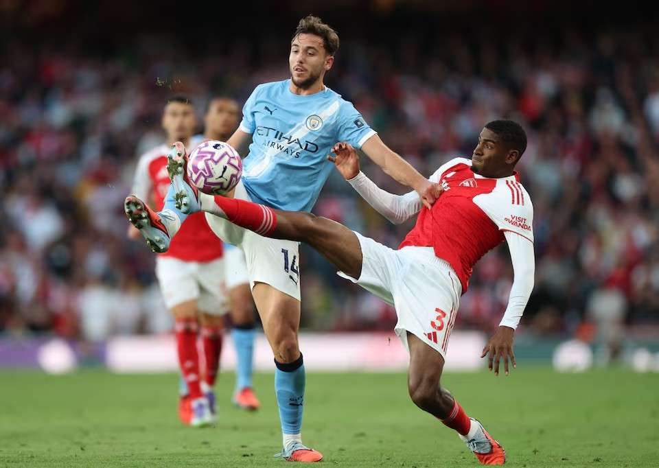 Gabriel Martinelli celebrates after scoring a last-minute equaliser for Arsenal against Manchester City at the Emirates Stadium