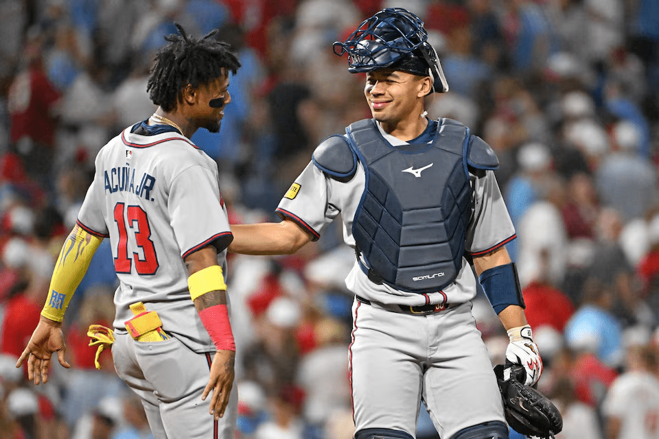 Atlanta Braves catcher Drake Baldwin celebrating with teammate Ronald Acuna Jr. after 9th-inning homer against Philadelphia Phillies